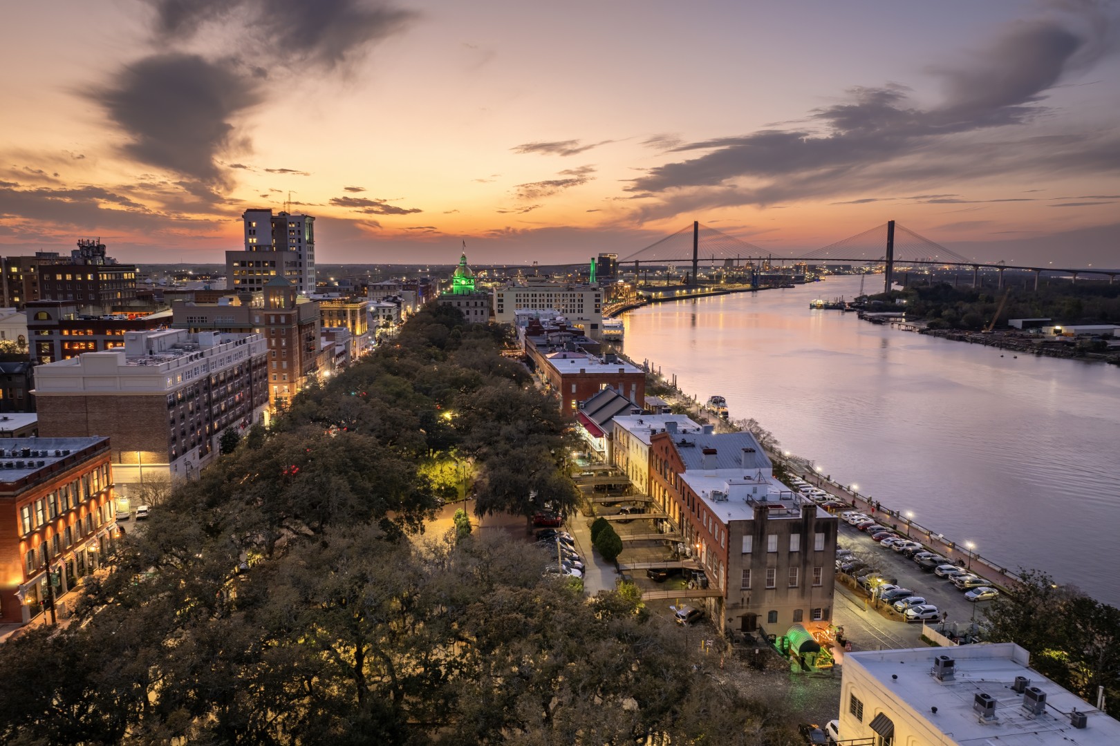 Aerial city and river view at sunset